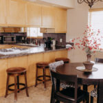 executive suite dining table and kitchen